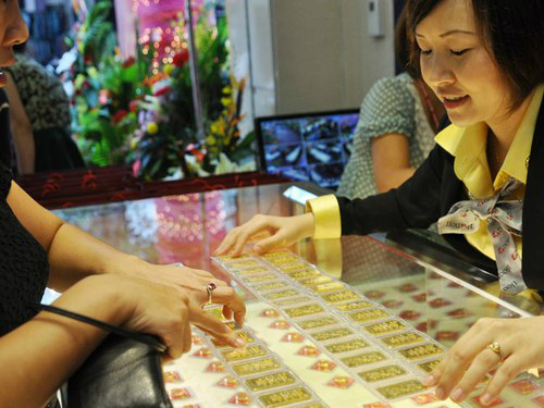 Vàng và USD cùng giảm giá