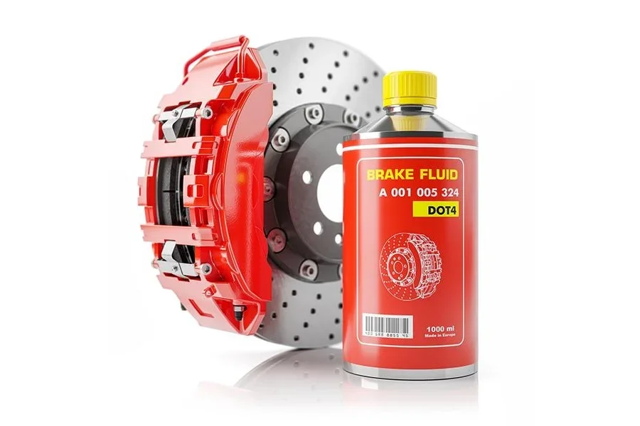 Chai dầu phanh bên cạnh đĩa phanh và caliper xe