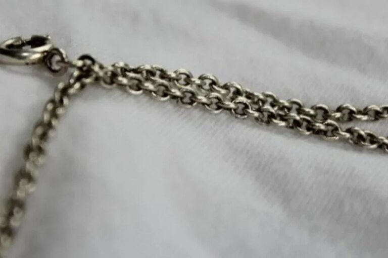 Close up of silver multilayer chain belt